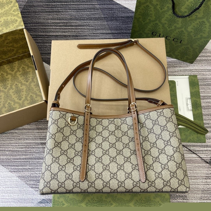 G*u*i shopping bags